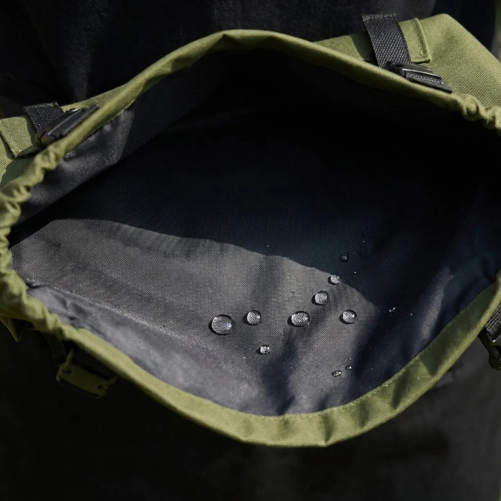 Water beading off the Grange Carrier harvest apron demonstrating water-resistant fabric